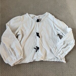 Girls Zara top size 11-12 white with black bows.